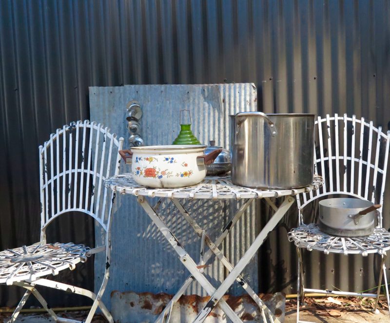 Vintage chairs and corrugated iron