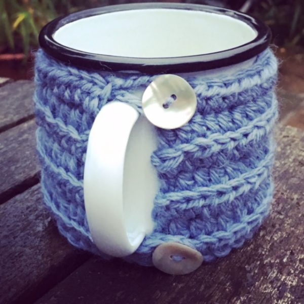 Hand-knitted mug cosy