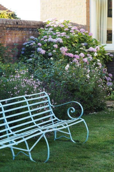 Think about planting and garden furniture together.