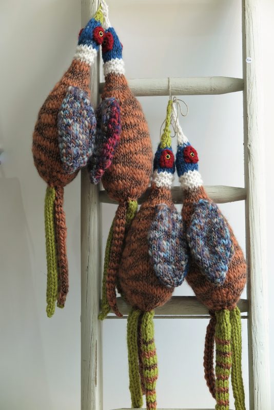 Hand-knitted pheasants